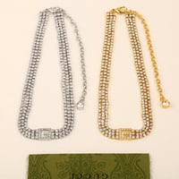 سيت جوتشي اكسسوار نسائي بلون فضي عقد وحلق واسوارة...