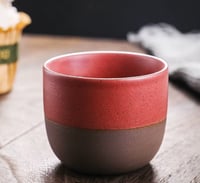 احمر - فخار داكن