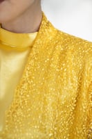 جلابية تل مطرز بفستان كوله اصفر