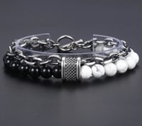 اسوارة رجالية ماركة خرز وستيل لون اسود و وابيض