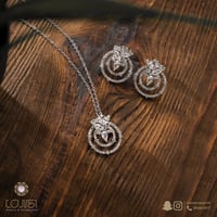 نص طقم زركون فضي