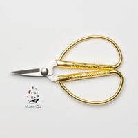 203 - مقص ورق ذهبي