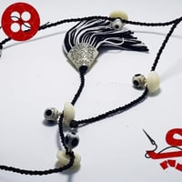 تركيبات عظم من ازراري لاناقة الثوب السعودي