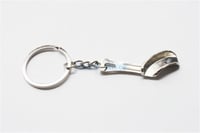 ميدالية مفاتيح أسنان