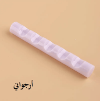 مسند بلاستيكي صغير لأقلام الخط والريش