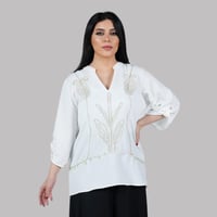 بلوزة كتان اوف وايت مع تطريز