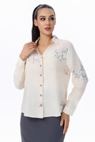 بلوزة بطبعة أوراق خيزران