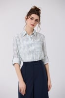 بلوزة كتان بتقليمات