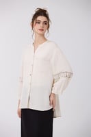 بلوزة كتان مع كلف