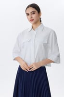 بلوزة كاجوال مخططة بأزرار وجيب