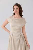 فستان ستان بيج مزين باللؤلؤ