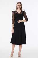 فستان استريتش أسود ميدي