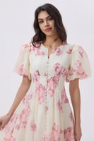 فستان ميدي مورد بأكمام منفوخه