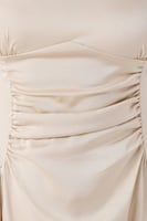 فستان ستان بيج مزين باللؤلؤ