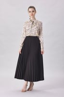 تنورة كلوش بكسرات