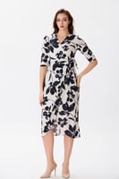 فستان قطن اوف وايت بنقشة الورد الأسود