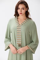 جلابية كتان اخضر بتقليم ذهبي