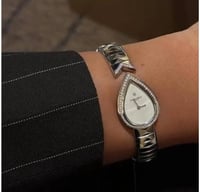 ساعة شوميه فضي