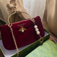 شنطة قوتشي لون عودي