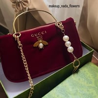 شنطة قوتشي لون عودي