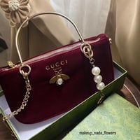 شنطة قوتشي لون عودي