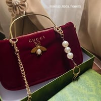 شنطة قوتشي لون عودي