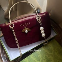 شنطة قوتشي لون عودي