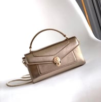 حقيبه بولغاري ذهبي