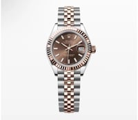 ساعة شوميه حلد اسود روز جولد