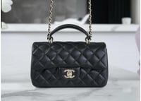 شنطة شانيل هاندل اسود 20 سم فضي