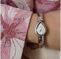 ساعة شوميه فضي