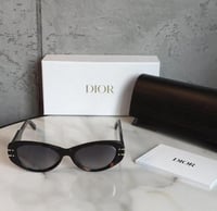 نظارة كريستيان ديور بني سجنتشر