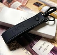 ميداليه ديور حلد كحلي