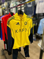 سويتر النصر الاصفر 2026