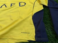 سويتر النصر الاصفر 2026