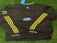 طقم يونايتد الاحتياطي (أكمام طويلة) 2026/2025