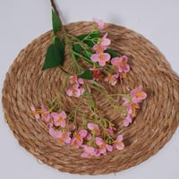 غصن زهور وردي فاتح