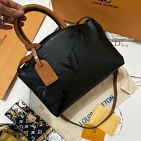 شنطة لويس فيتون