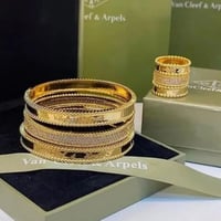 طقم اساور فان كليف ذهبي