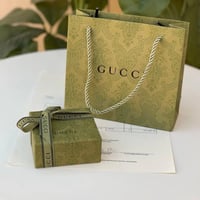 اسوارة قوتشي مع التغليف