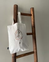 حقيبة مطرَّزة (يفتح برحمته أبواب)