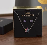 طقم سلسال وحلق كوتش