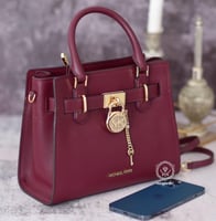 شنطة مايكل كورس