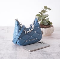 شنطة مايكل كورس