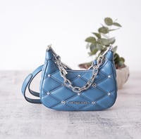 شنطة مايكل كورس