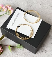 حلق مايكل كورس