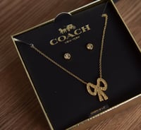 طقم سلسال و حلق كوتش