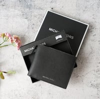 محفظة مايكل كورس