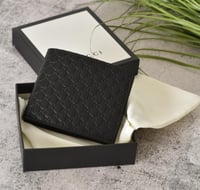 محفظة قوتشي