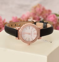 ساعة مايكل كورس